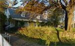 The sun rises over Alice Austen House and Park, illuminating its gorgeous grounds. Photo by Flint Gennari.